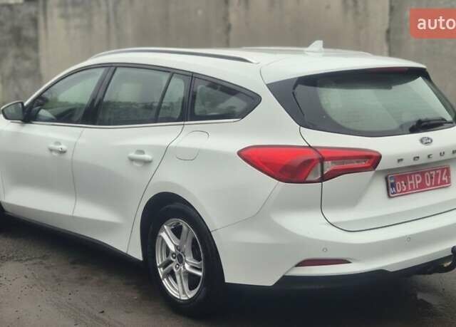 Білий Форд Фокус, об'ємом двигуна 1.5 л та пробігом 199 тис. км за 11900 $, фото 4 на Automoto.ua