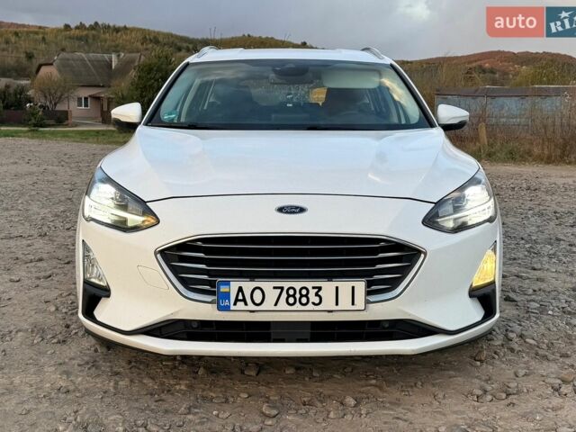 Белый Форд Фокус, объемом двигателя 2 л и пробегом 245 тыс. км за 13500 $, фото 15 на Automoto.ua