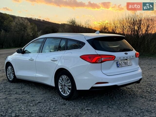 Білий Форд Фокус, об'ємом двигуна 2 л та пробігом 245 тис. км за 13700 $, фото 12 на Automoto.ua