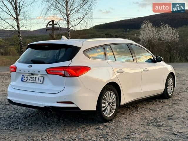Білий Форд Фокус, об'ємом двигуна 2 л та пробігом 245 тис. км за 13700 $, фото 11 на Automoto.ua