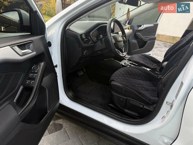 Білий Форд Фокус, об'ємом двигуна 1.5 л та пробігом 205 тис. км за 12400 $, фото 13 на Automoto.ua