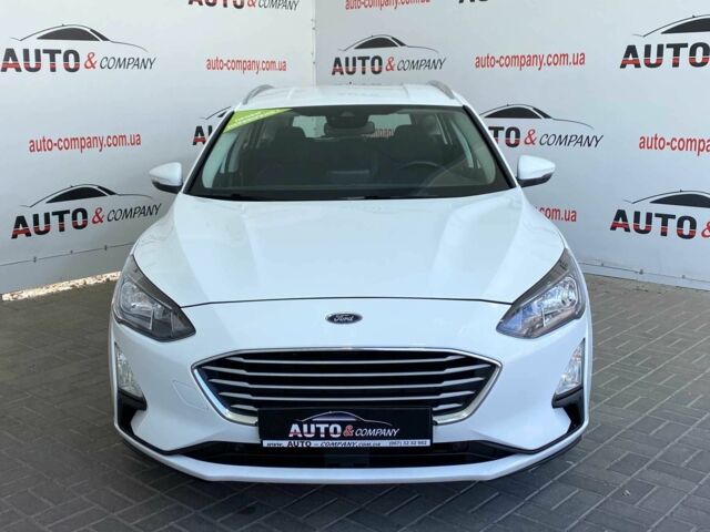 Белый Форд Фокус, объемом двигателя 1.5 л и пробегом 194 тыс. км за 13950 $, фото 1 на Automoto.ua