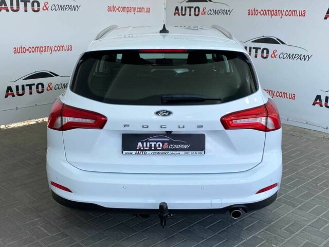 Белый Форд Фокус, объемом двигателя 1.5 л и пробегом 194 тыс. км за 13950 $, фото 3 на Automoto.ua