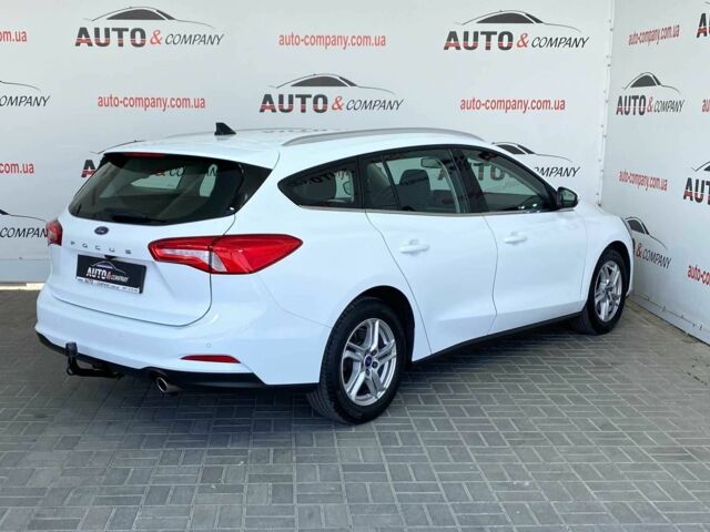 Белый Форд Фокус, объемом двигателя 1.5 л и пробегом 194 тыс. км за 13950 $, фото 2 на Automoto.ua