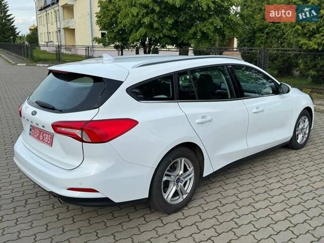 Белый Форд Фокус, объемом двигателя 1.5 л и пробегом 230 тыс. км за 12600 $, фото 13 на Automoto.ua