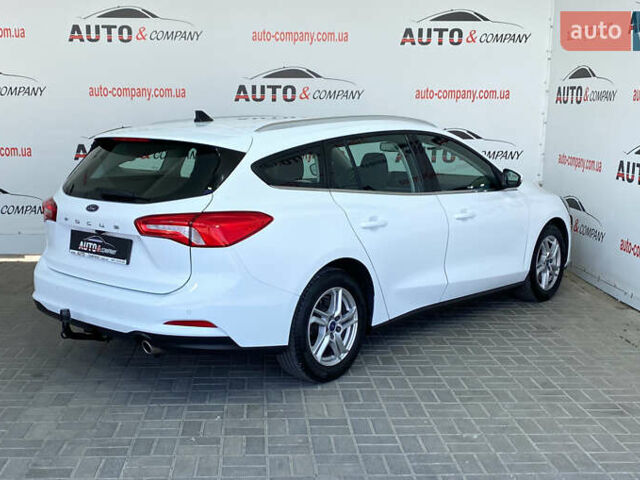 Белый Форд Фокус, объемом двигателя 1.5 л и пробегом 194 тыс. км за 13950 $, фото 2 на Automoto.ua