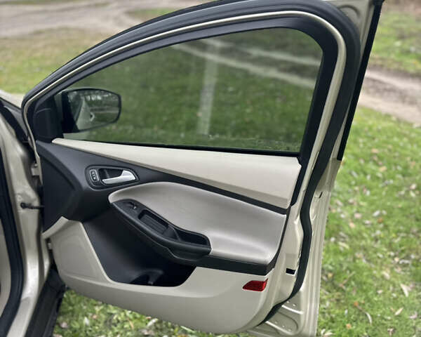 Бежевый Форд Фокус, объемом двигателя 2 л и пробегом 115 тыс. км за 7299 $, фото 24 на Automoto.ua