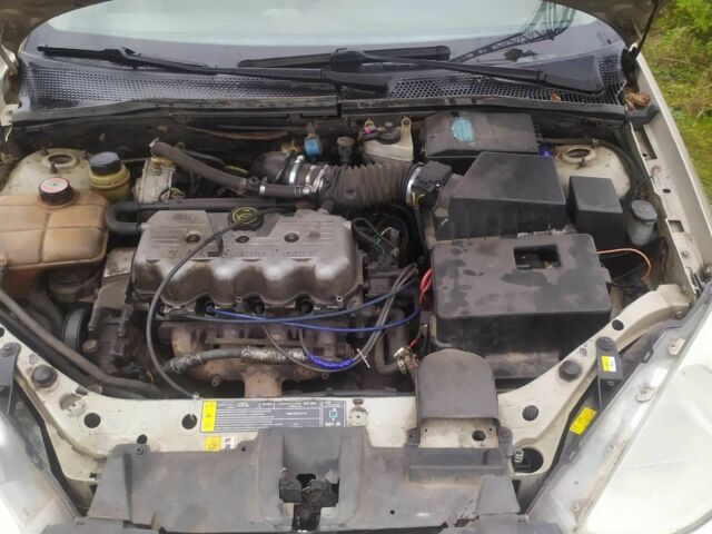 Бежевий Форд Фокус, об'ємом двигуна 2 л та пробігом 200 тис. км за 1700 $, фото 9 на Automoto.ua