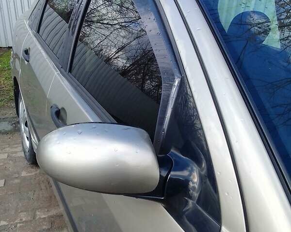 Бежевый Форд Фокус, объемом двигателя 1.6 л и пробегом 351 тыс. км за 3000 $, фото 7 на Automoto.ua