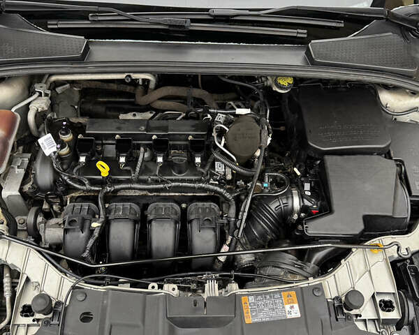 Бежевий Форд Фокус, об'ємом двигуна 2 л та пробігом 124 тис. км за 8400 $, фото 14 на Automoto.ua