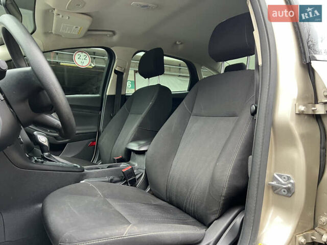 Бежевый Форд Фокус, объемом двигателя 2 л и пробегом 128 тыс. км за 7800 $, фото 32 на Automoto.ua