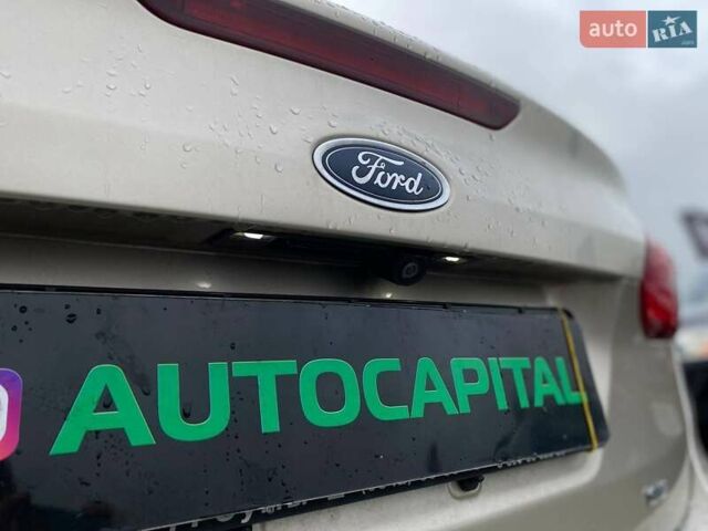 Бежевий Форд Фокус, об'ємом двигуна 2 л та пробігом 180 тис. км за 8990 $, фото 13 на Automoto.ua