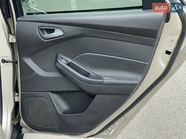 Бежевый Форд Фокус, объемом двигателя 2 л и пробегом 128 тыс. км за 7800 $, фото 48 на Automoto.ua