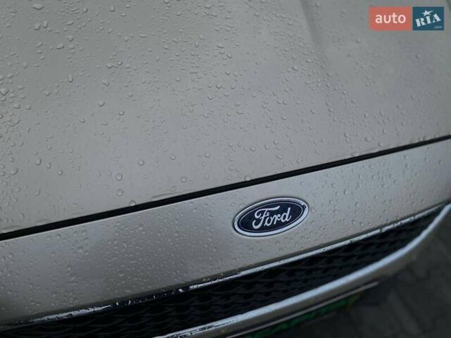 Бежевий Форд Фокус, об'ємом двигуна 2 л та пробігом 180 тис. км за 8990 $, фото 7 на Automoto.ua
