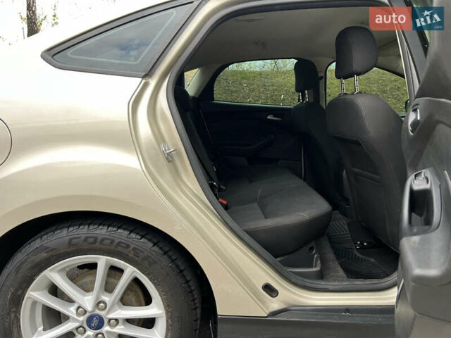 Бежевый Форд Фокус, объемом двигателя 2 л и пробегом 128 тыс. км за 7800 $, фото 49 на Automoto.ua