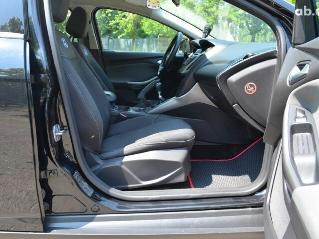 Черный Форд Фокус, объемом двигателя 1.6 л и пробегом 225 тыс. км за 7500 $, фото 11 на Automoto.ua