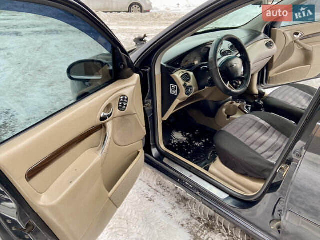 Черный Форд Фокус, объемом двигателя 1.6 л и пробегом 285 тыс. км за 2850 $, фото 16 на Automoto.ua