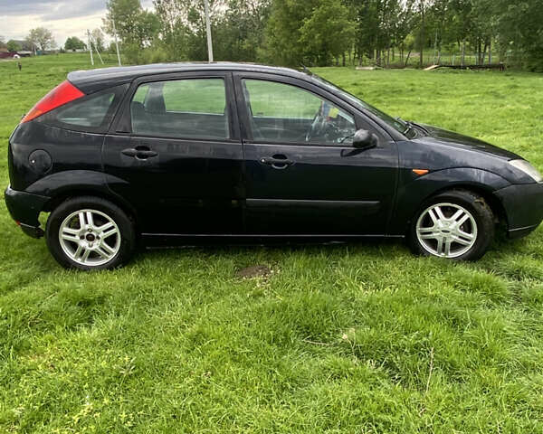 Черный Форд Фокус, объемом двигателя 1.8 л и пробегом 280 тыс. км за 3300 $, фото 2 на Automoto.ua