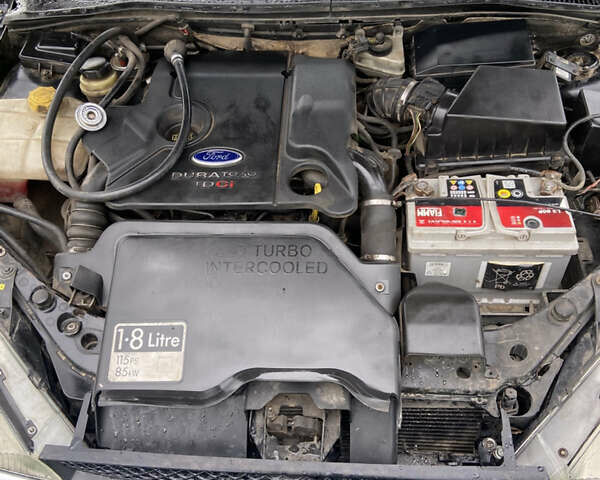 Черный Форд Фокус, объемом двигателя 1.8 л и пробегом 280 тыс. км за 3300 $, фото 6 на Automoto.ua