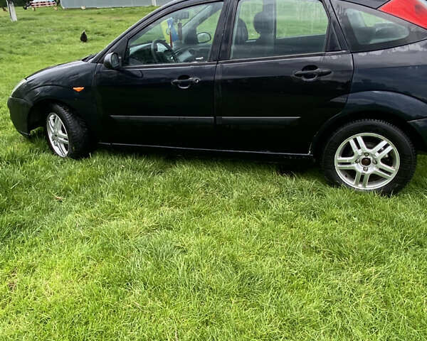 Черный Форд Фокус, объемом двигателя 1.8 л и пробегом 280 тыс. км за 3300 $, фото 4 на Automoto.ua