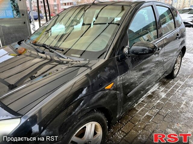 Черный Форд Фокус, объемом двигателя 1.8 л и пробегом 308 тыс. км за 3200 $, фото 4 на Automoto.ua