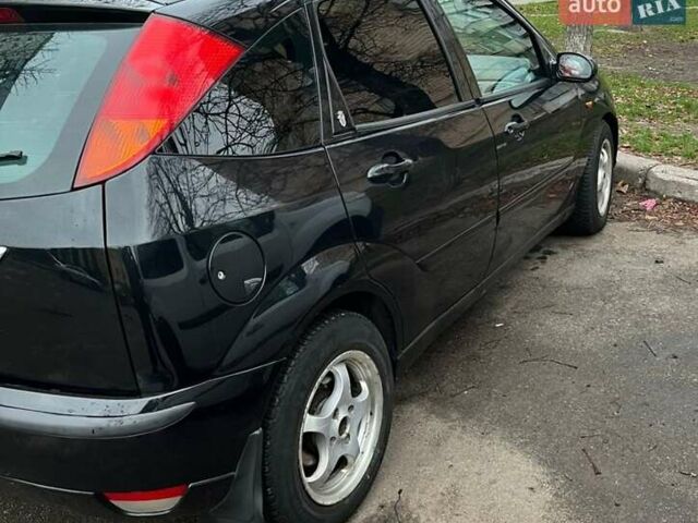 Черный Форд Фокус, объемом двигателя 1.8 л и пробегом 306 тыс. км за 4500 $, фото 5 на Automoto.ua