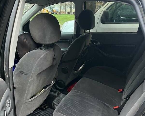 Черный Форд Фокус, объемом двигателя 1.8 л и пробегом 306 тыс. км за 4500 $, фото 8 на Automoto.ua