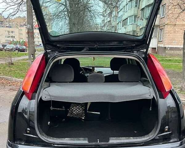 Черный Форд Фокус, объемом двигателя 1.8 л и пробегом 306 тыс. км за 4500 $, фото 9 на Automoto.ua