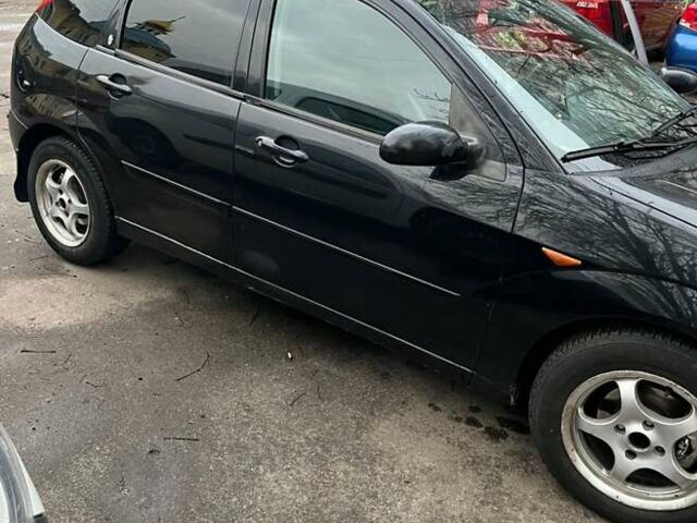 Черный Форд Фокус, объемом двигателя 1.8 л и пробегом 306 тыс. км за 4500 $, фото 4 на Automoto.ua