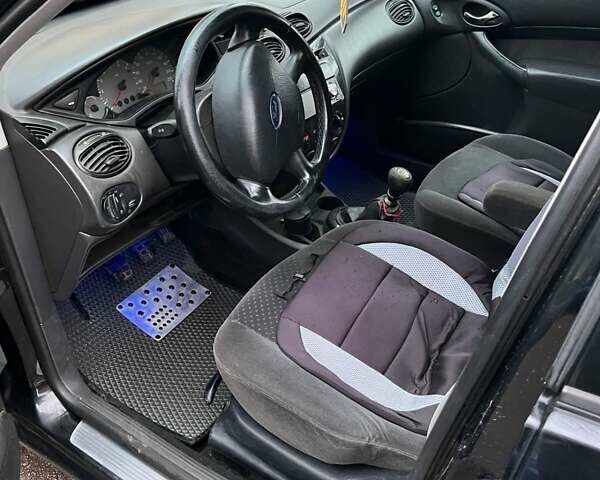 Черный Форд Фокус, объемом двигателя 1.8 л и пробегом 306 тыс. км за 4500 $, фото 7 на Automoto.ua