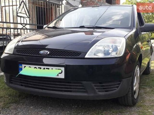 Чорний Форд Фокус, об'ємом двигуна 1.4 л та пробігом 125 тис. км за 3500 $, фото 8 на Automoto.ua