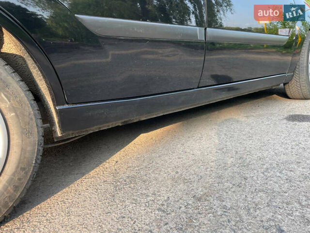 Черный Форд Фокус, объемом двигателя 1.6 л и пробегом 268 тыс. км за 3800 $, фото 4 на Automoto.ua