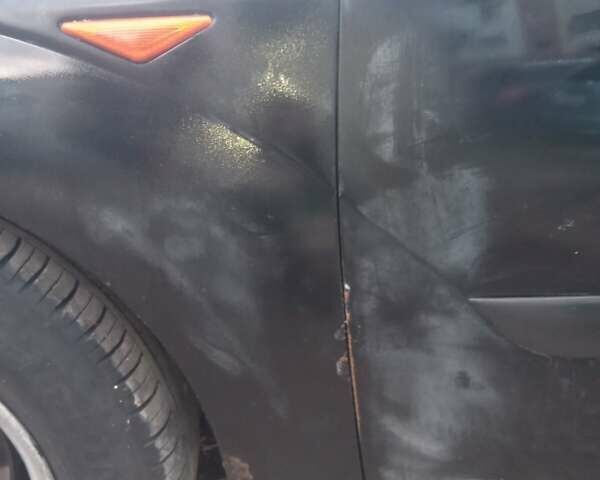 Чорний Форд Фокус, об'ємом двигуна 1.79 л та пробігом 246 тис. км за 3700 $, фото 19 на Automoto.ua