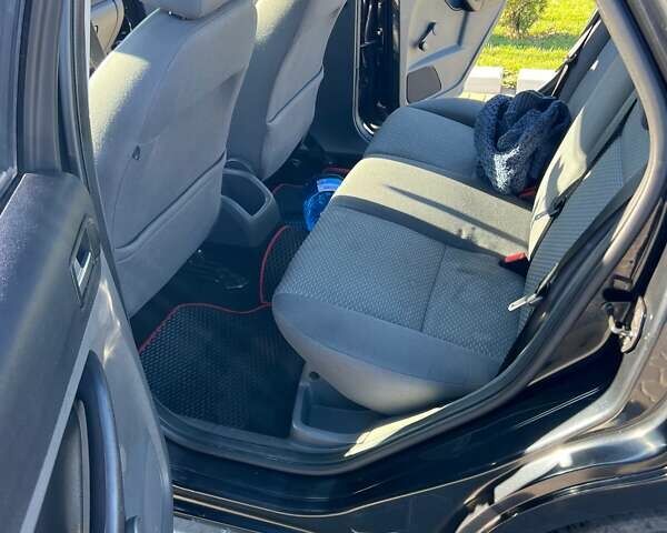 Черный Форд Фокус, объемом двигателя 1.6 л и пробегом 290 тыс. км за 5000 $, фото 7 на Automoto.ua