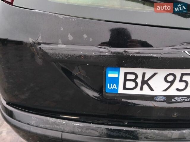 Черный Форд Фокус, объемом двигателя 2.01 л и пробегом 207 тыс. км за 2000 $, фото 7 на Automoto.ua