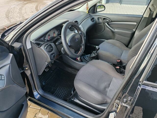 Черный Форд Фокус, объемом двигателя 1.8 л и пробегом 365 тыс. км за 2300 $, фото 17 на Automoto.ua