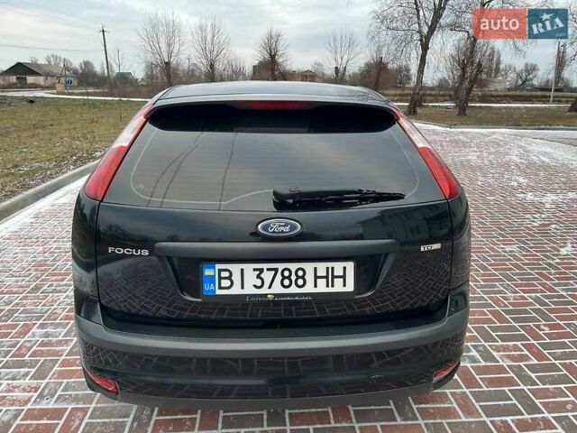 Чорний Форд Фокус, об'ємом двигуна 1.56 л та пробігом 276 тис. км за 4250 $, фото 4 на Automoto.ua