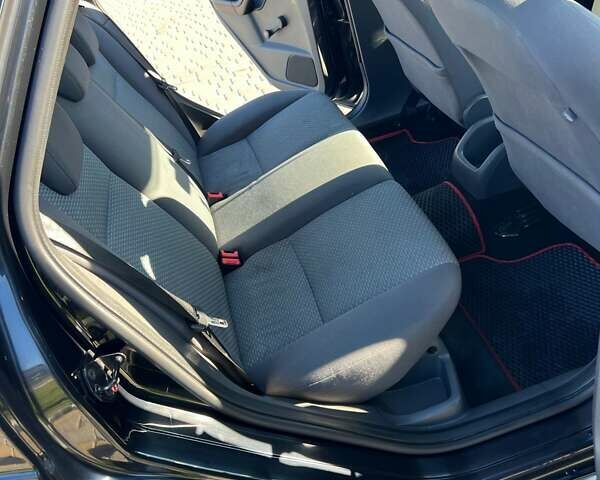 Черный Форд Фокус, объемом двигателя 1.6 л и пробегом 290 тыс. км за 5000 $, фото 4 на Automoto.ua