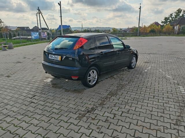 Черный Форд Фокус, объемом двигателя 1.8 л и пробегом 365 тыс. км за 2300 $, фото 6 на Automoto.ua