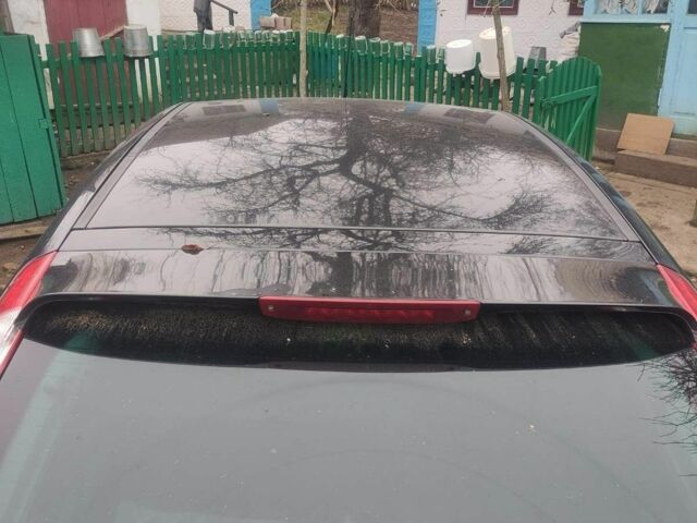 Черный Форд Фокус, объемом двигателя 1.6 л и пробегом 300 тыс. км за 1200 $, фото 6 на Automoto.ua