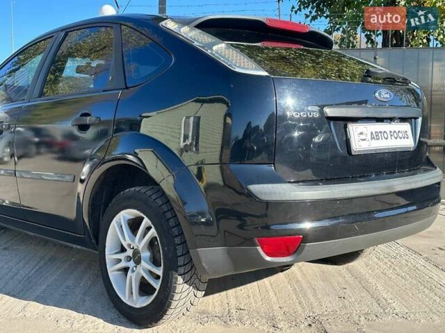 Черный Форд Фокус, объемом двигателя 1.6 л и пробегом 239 тыс. км за 5190 $, фото 7 на Automoto.ua