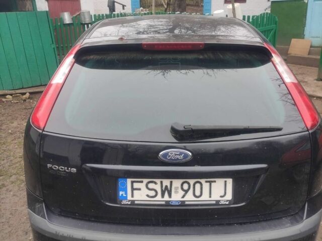 Черный Форд Фокус, объемом двигателя 1.6 л и пробегом 300 тыс. км за 1200 $, фото 1 на Automoto.ua