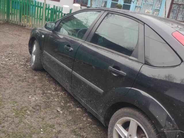 Черный Форд Фокус, объемом двигателя 1.6 л и пробегом 300 тыс. км за 1200 $, фото 3 на Automoto.ua