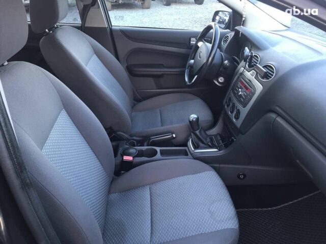 Черный Форд Фокус, объемом двигателя 1.6 л и пробегом 167 тыс. км за 5390 $, фото 18 на Automoto.ua