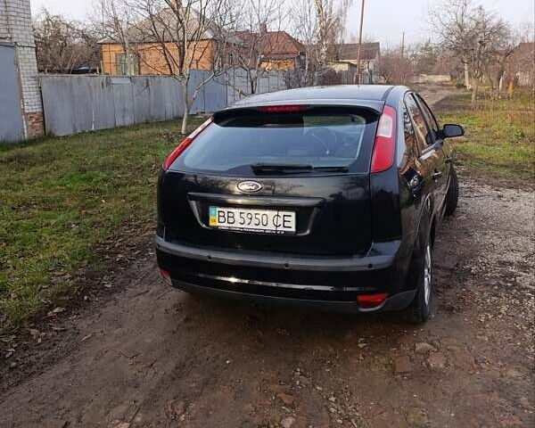 Черный Форд Фокус, объемом двигателя 1.6 л и пробегом 233 тыс. км за 3400 $, фото 2 на Automoto.ua