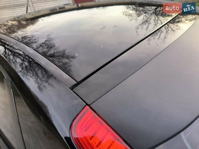 Черный Форд Фокус, объемом двигателя 1.6 л и пробегом 238 тыс. км за 4900 $, фото 5 на Automoto.ua