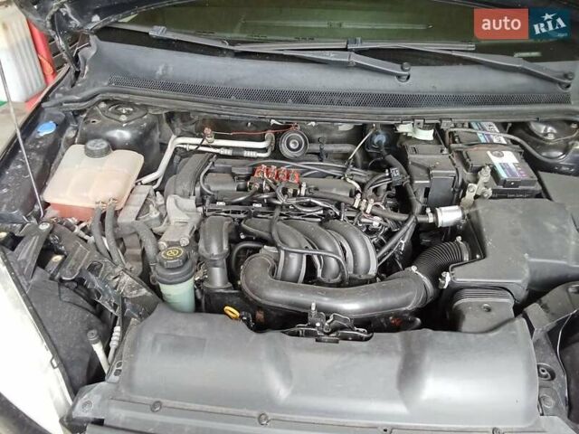 Черный Форд Фокус, объемом двигателя 1.6 л и пробегом 228 тыс. км за 3850 $, фото 6 на Automoto.ua