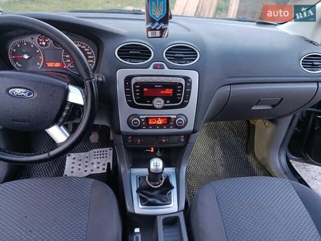 Форд Фокус 2007 у Житомирі на Automoto.ua Чорний Форд Фокус, об'ємом двигуна 1.6 л та пробігом 222 тис. км за 4200 $, фото 3 на Automoto.ua