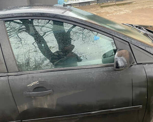 Черный Форд Фокус, объемом двигателя 1.6 л и пробегом 257 тыс. км за 3000 $, фото 10 на Automoto.ua