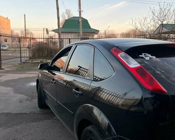 Чорний Форд Фокус, об'ємом двигуна 2 л та пробігом 313 тис. км за 3250 $, фото 4 на Automoto.ua